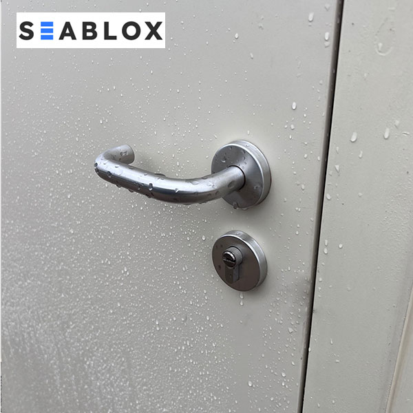 Shipping container door handle and lock hardware